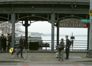 Mayor McGinn leaving the press conference at the Washington Street Public Boat Landing. Photo by Darren  Dencklau