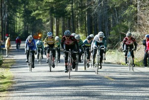 The sun greets Cat 4 women at the finish of the Mason Lake Road Race. Photo courtesy of Amara Boursaw / Wheels in Focus 