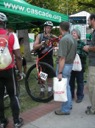 Two-day unicycle finisher. His brother, pictured standing before him, finished on a unicycle in one day.