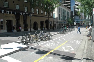 Bike Boulevards, bike corrals, and separation from auto traffic all combined to create a better and safer experience for all.  Photo courtesy of City of Vancouver 