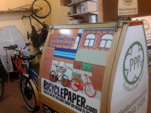 Bicycle Paper is now delivered by bike in the Portland area.  Photo courtesy of Portland Pedal Power 
