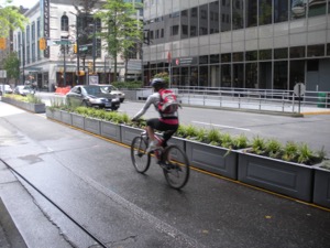 Medians that separate cyclists and motorists don't have to be boring concrete structures. Photo by City of Vancouver 